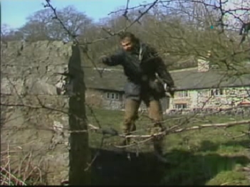 Charles rushes down the side of the bridge, and into the river