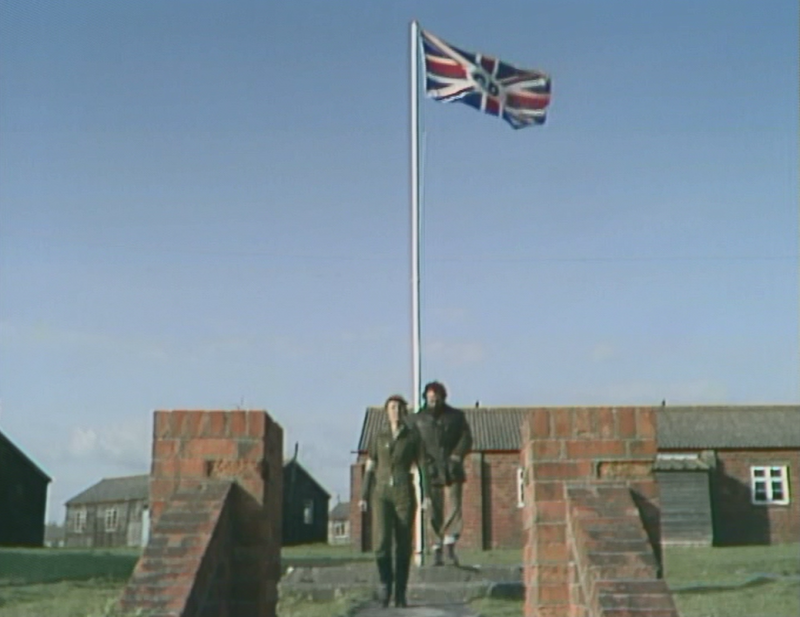 Charles and Agnes beneath the new GP flag - Long Live the King